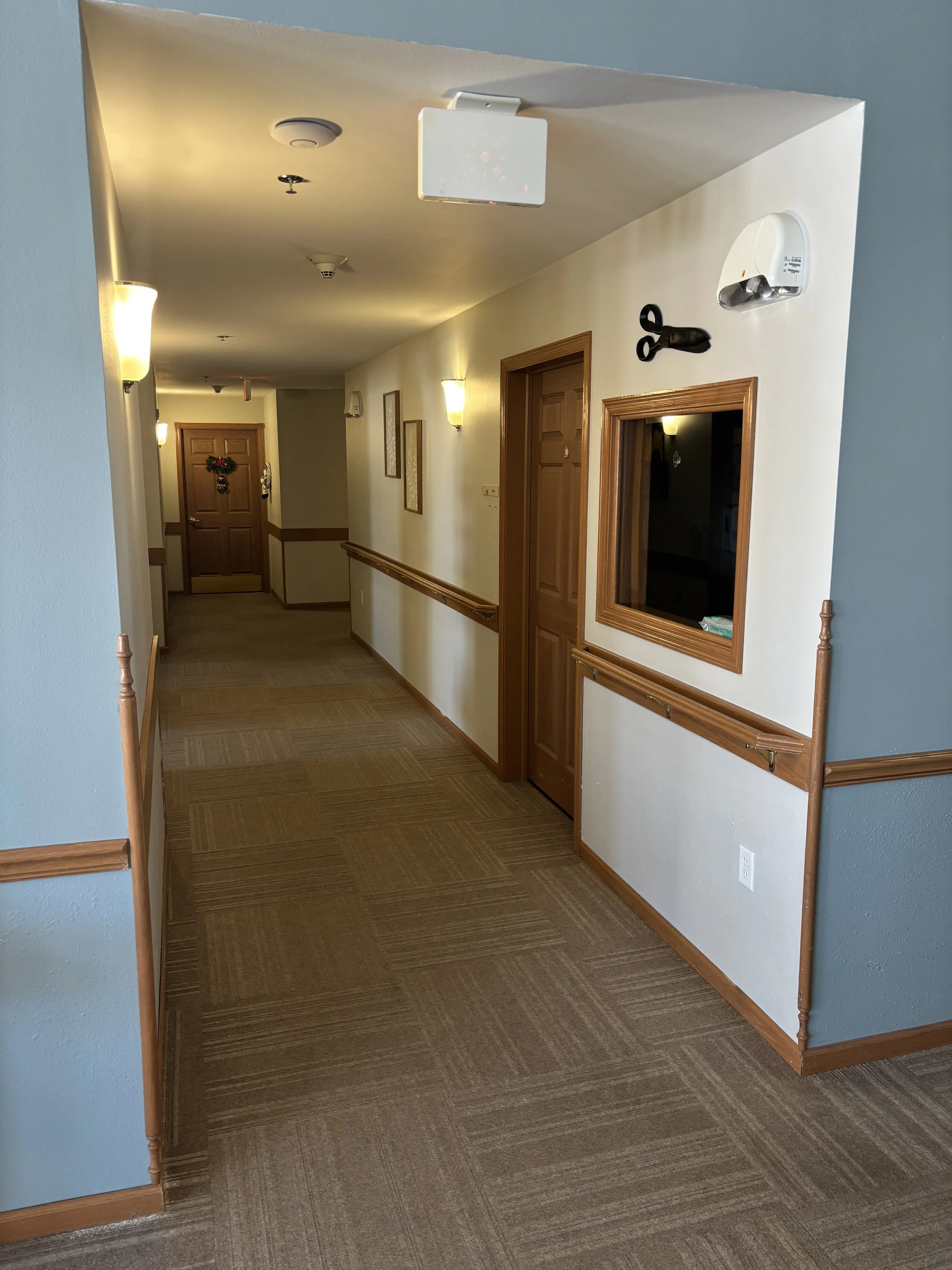 Hallway leading to salon at Havenfield.