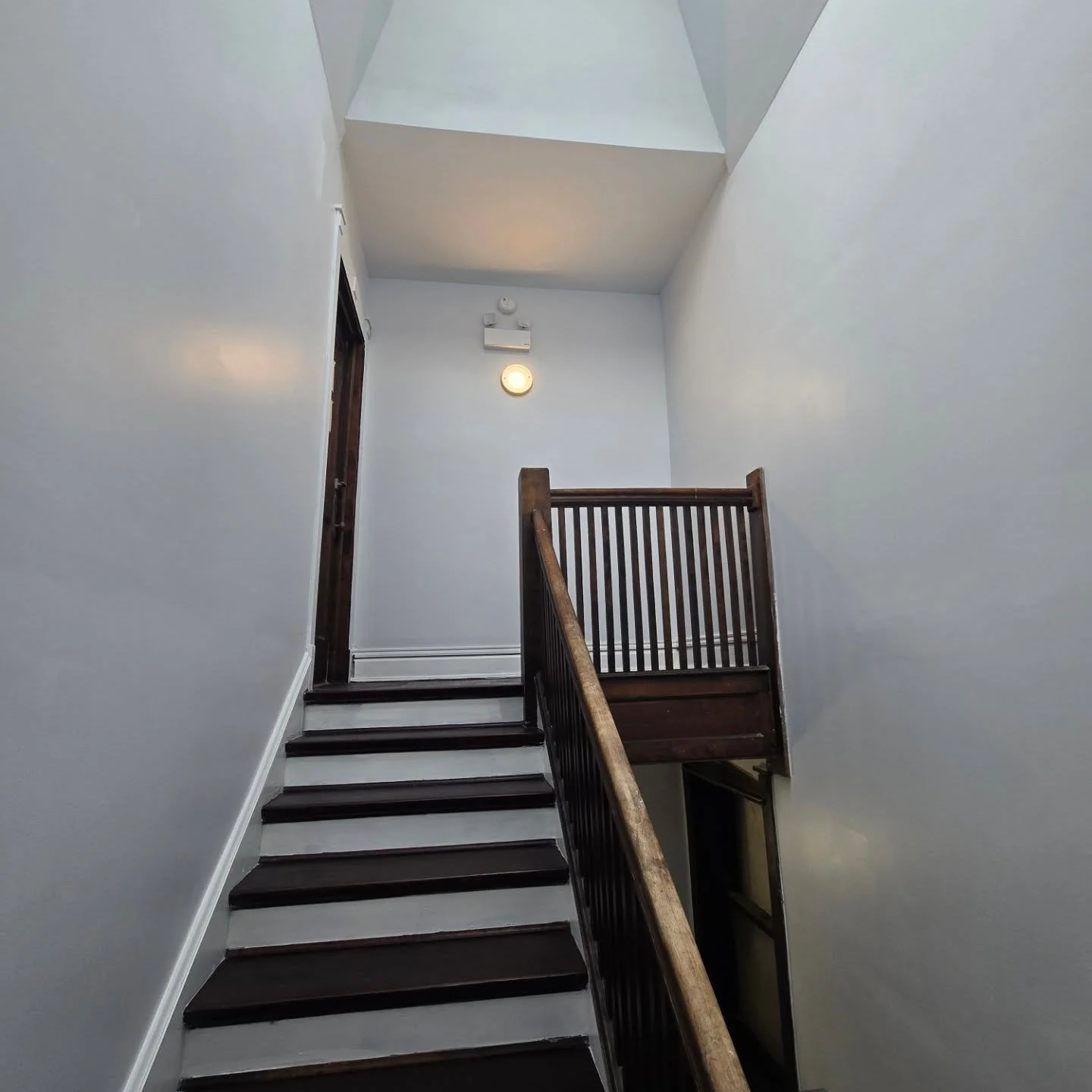 ✨ Stairway Transformation Complete ✨
What started as an aging stairwell with damaged walls and mold concerns is now a refreshed, modern, and clean space filled with natural light from the skylight above.

Our team completed: 
✔️ Tear-off of old damag