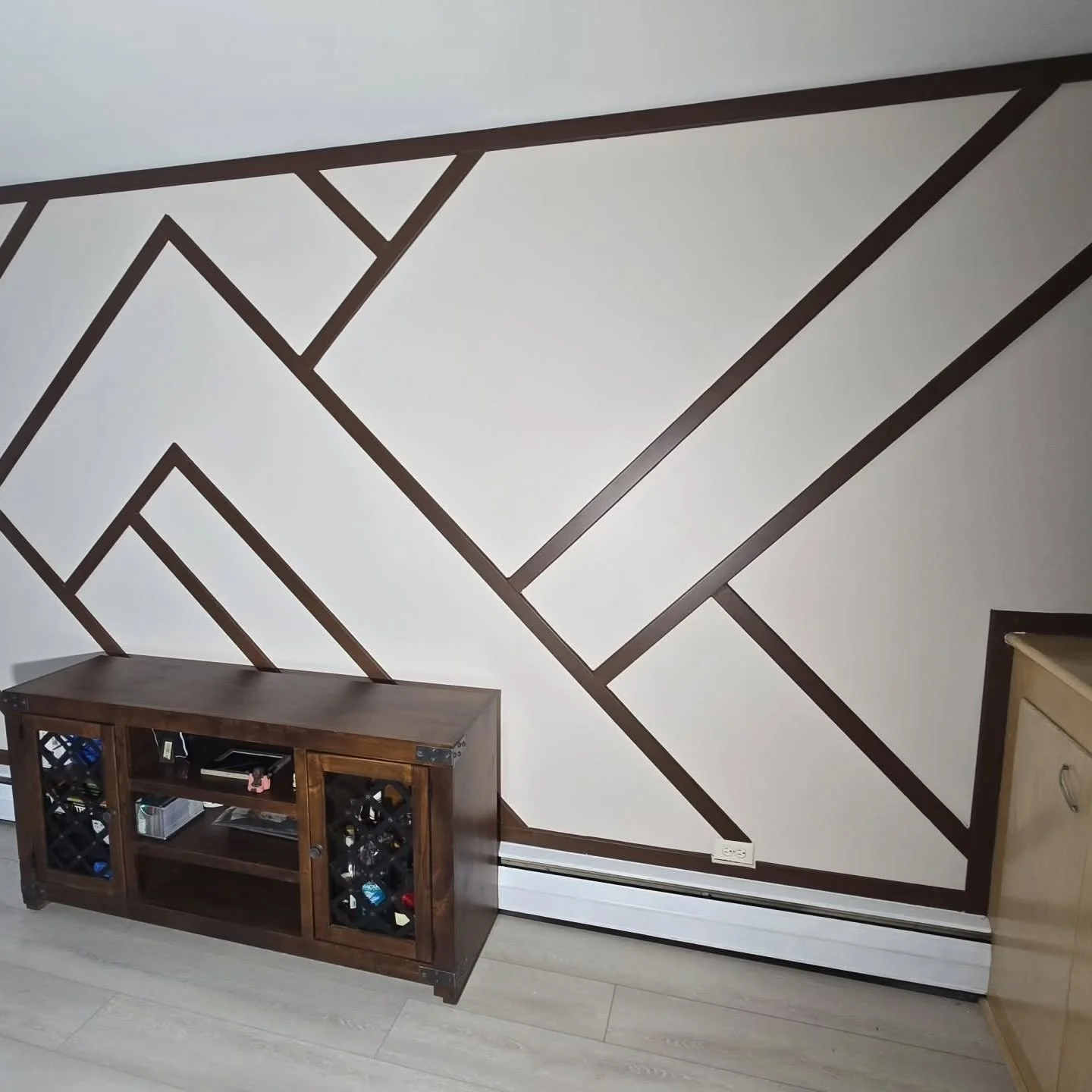 ✨ Before &amp; After: Custom Accent Wall Transformation ✨
This room went from a plain painted wall to a custom modern feature wall that completely changes the look and feel of the space.

✅ Designed and installed custom geometric trim accent walls
✅ 