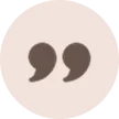 Speech bubble icon with quotation marks inside