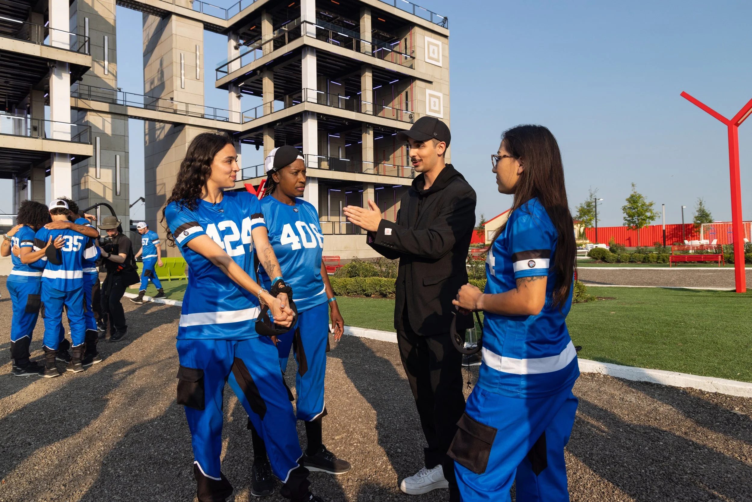 Praying in the background as Tareq talks to Courtney and Dayna, Dayna the girl on the far right also came to believe in Jesus on set and later got baptized by one of my best friends Nelly, also on the remote island! (pray Dayna continues to grow in h