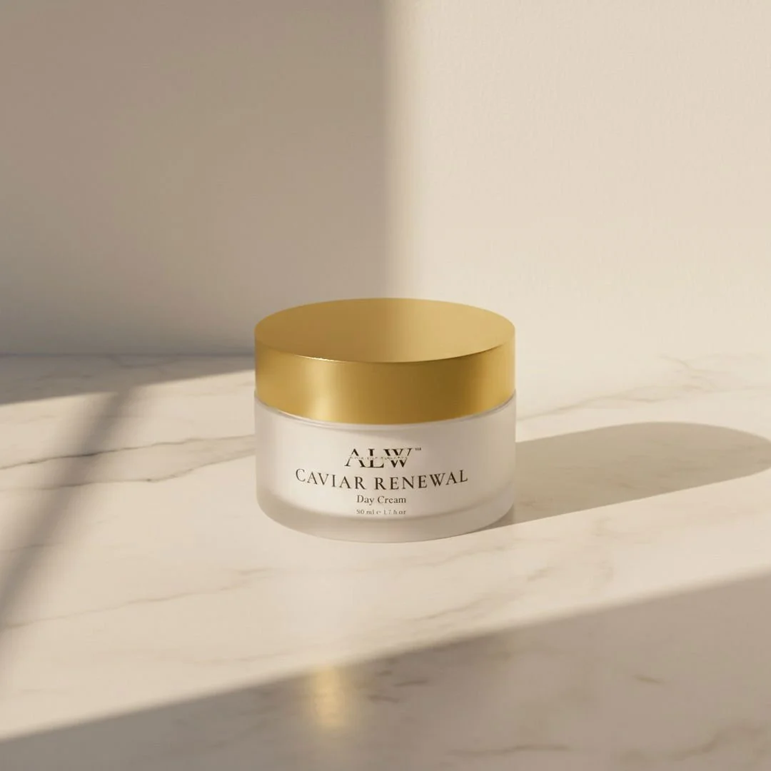 A jar of ATW Caviar Renewal Day Cream on a marble surface with shadows and sunlight.