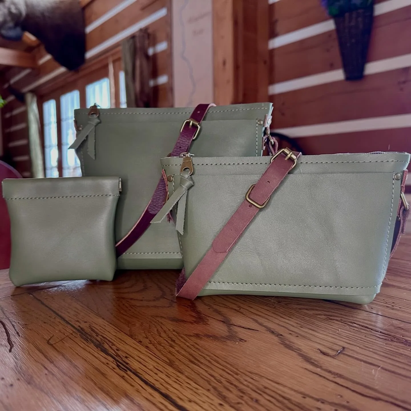 I'm excited to introduce three new solid colors to the lineup: Loden green, bright mustard, and peacock blue! They'll be available on the website soon, so be sure to check them out. As always, custom-sized bags and totes are available. www.hbkleather