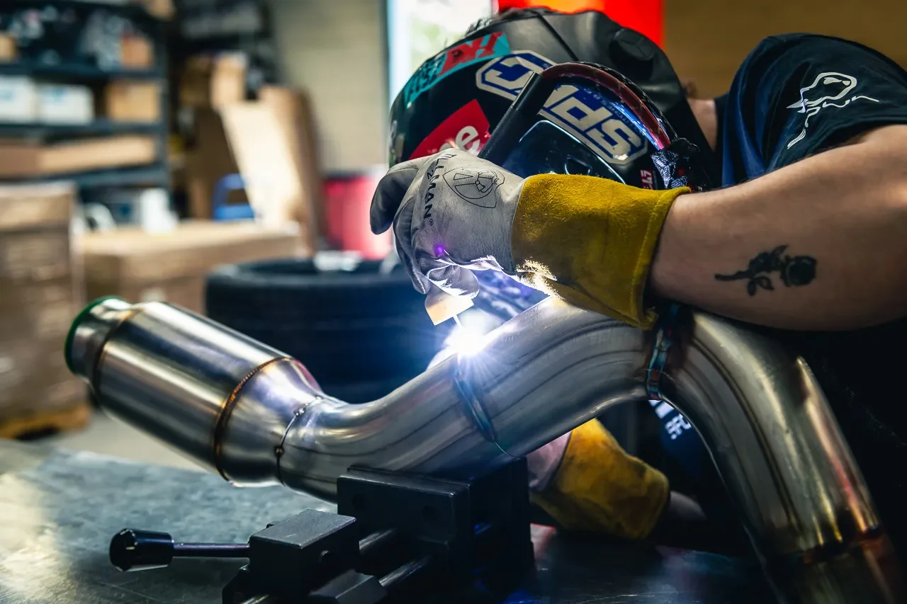 SOUL-Performance-Products-718-GT4-RS-Resonated-Over-Axle-Pipes-Build.webp