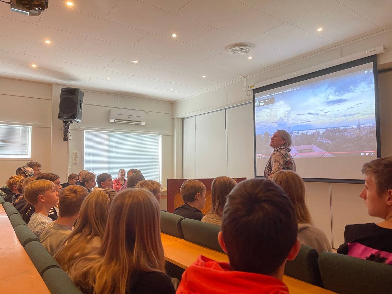 Emgrace visiting school in Norway, telling them about Cambodia.