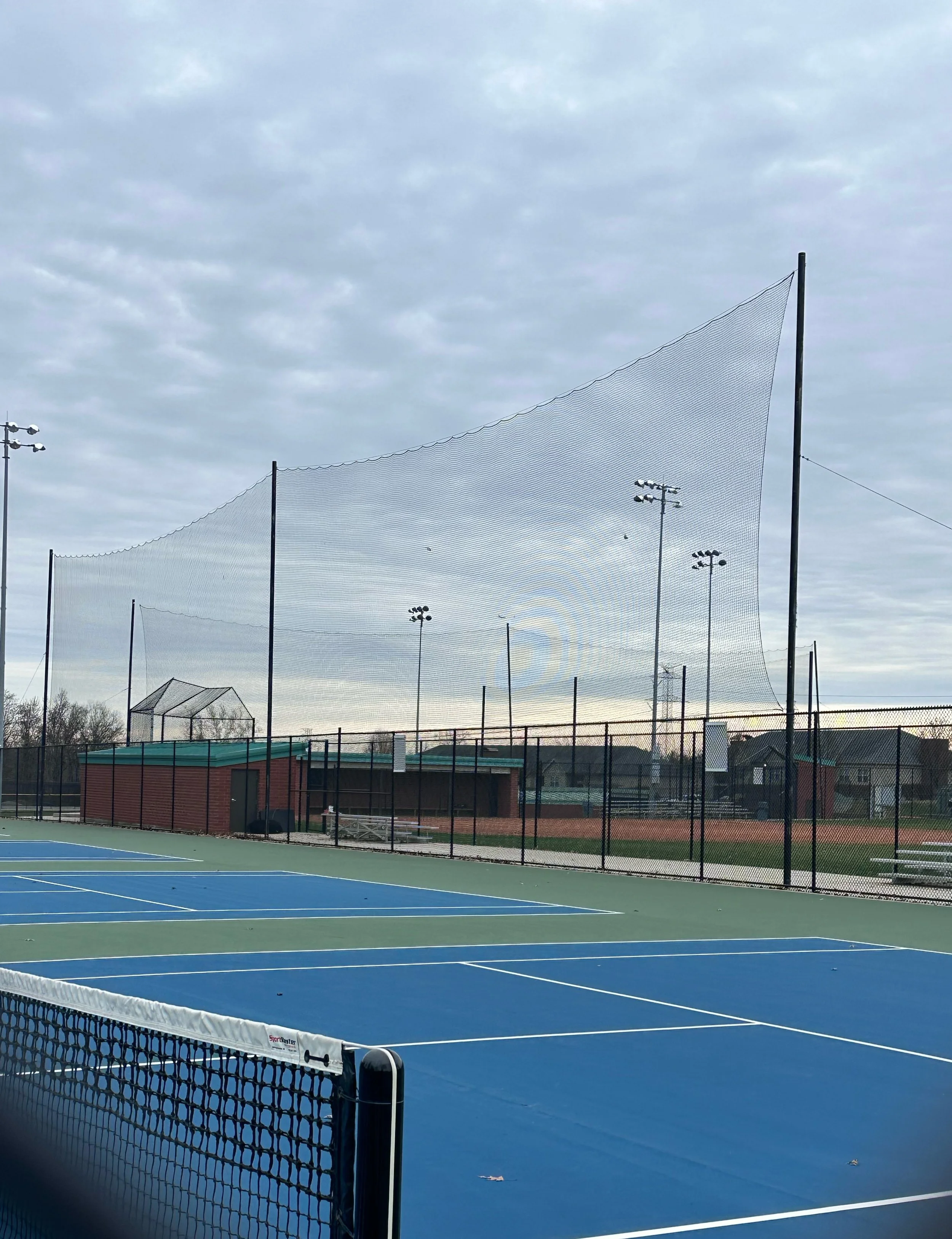 Baseball, softball field barrier netting