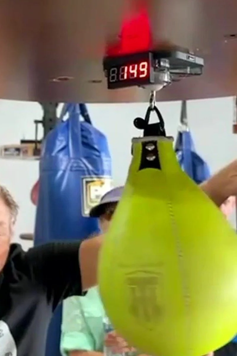 The LED screen on the Speedbag Champ counter showing 149, with a yellow speed bag on the swivel below it
