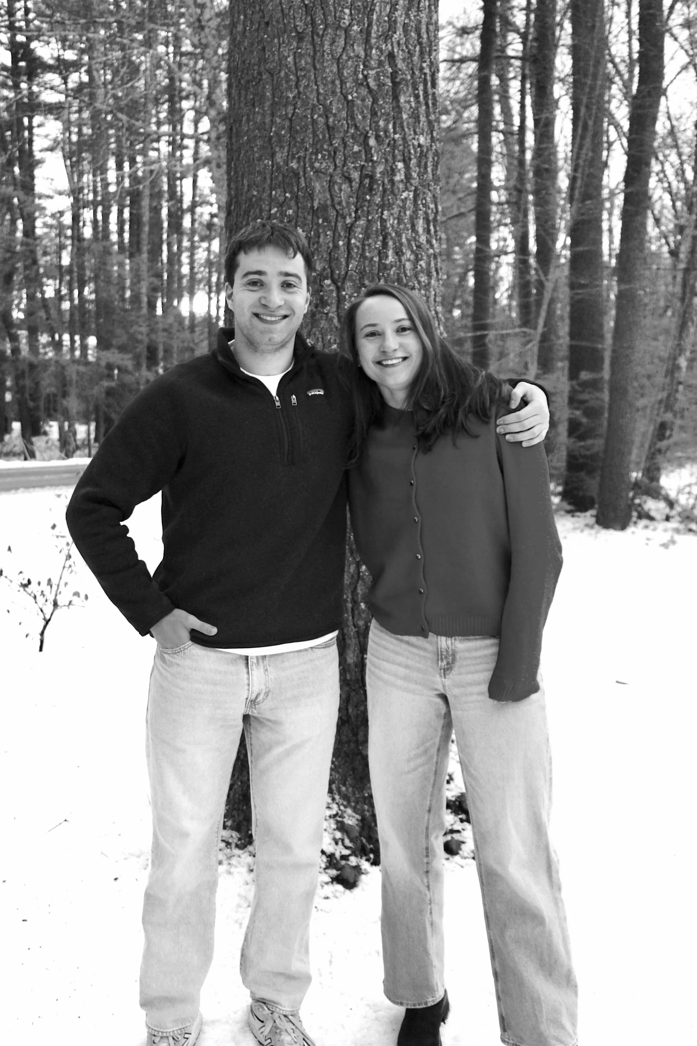 Photo of co-founders, Sammie and Teddy Weaver. They are smiling together in front of a large tree.