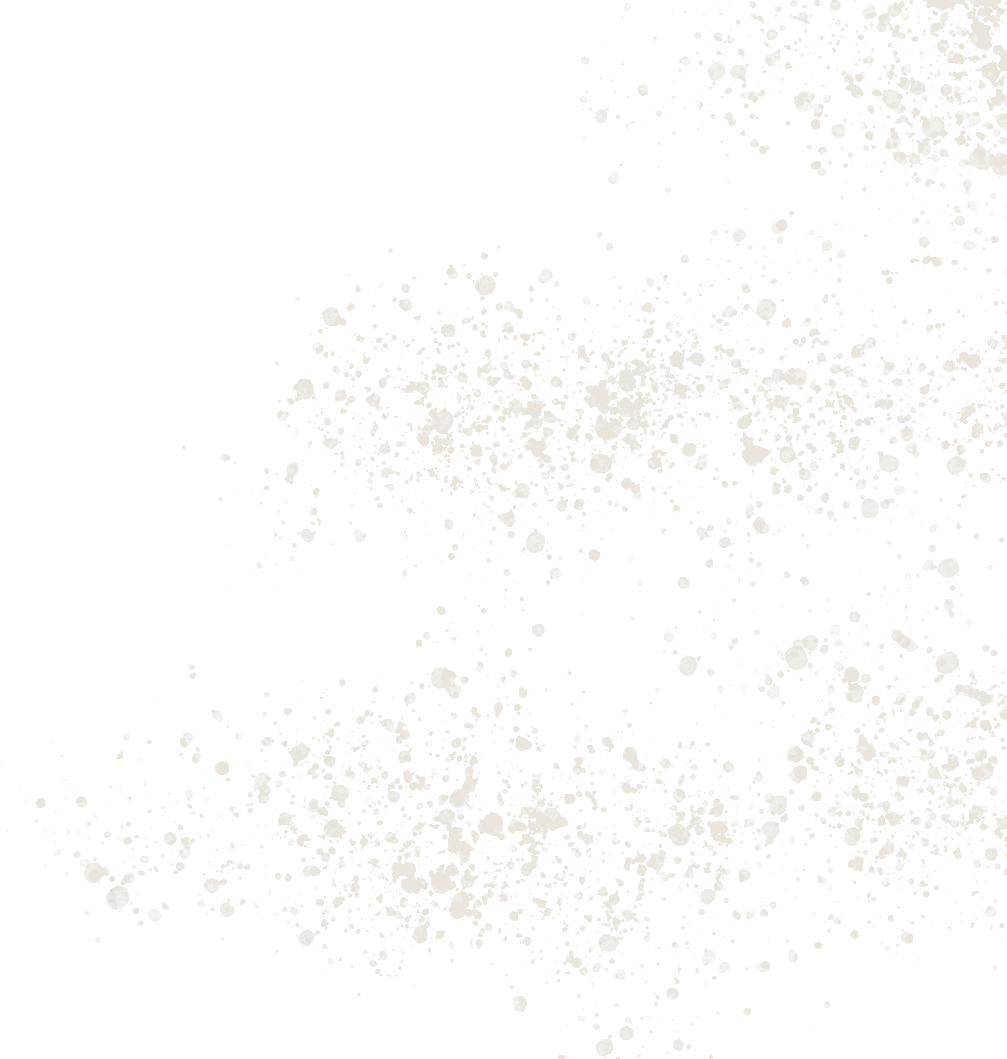 White splatter paint or ink splashes on a black background.