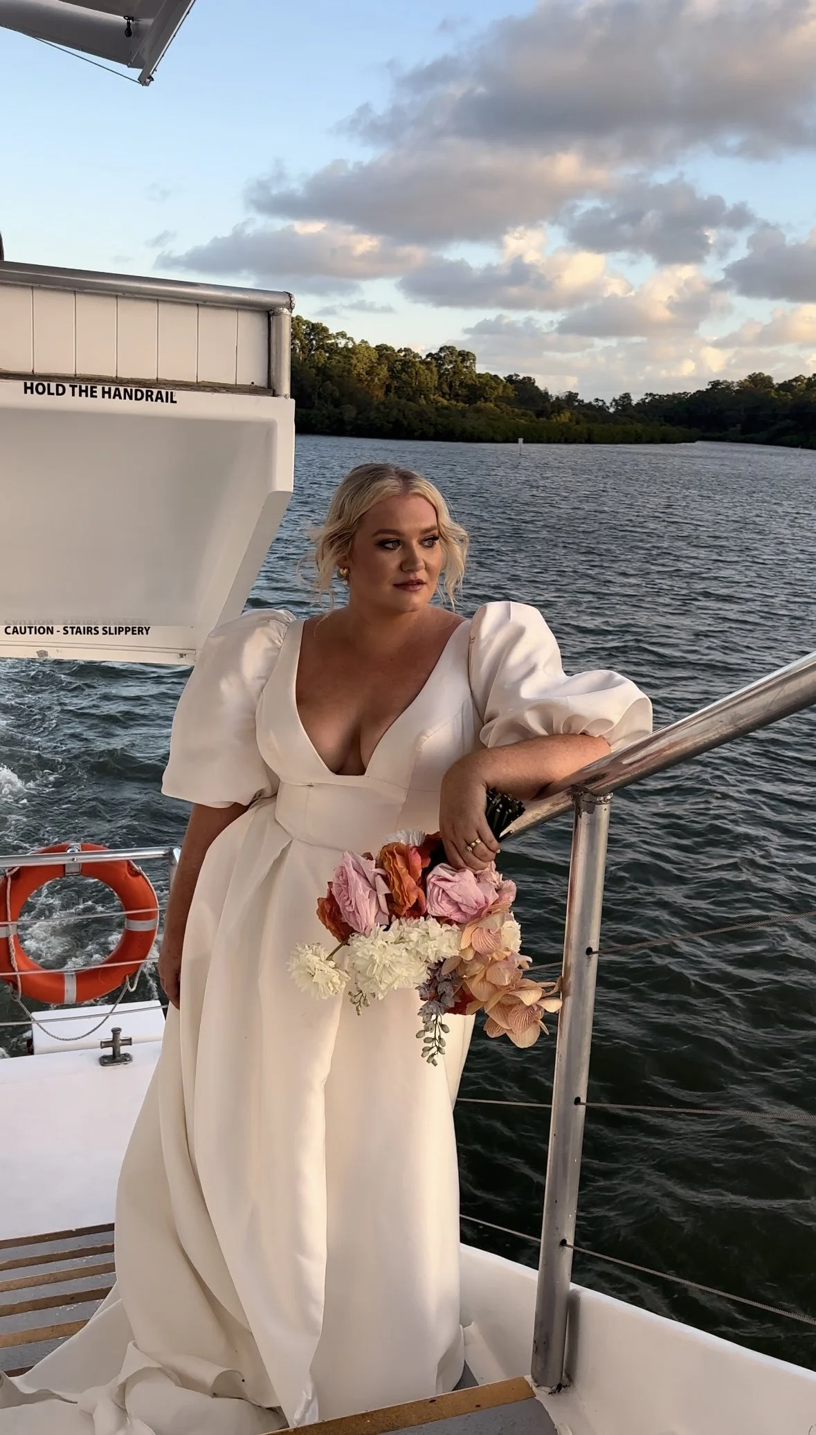 bride at wedding on boat content creator yeppoon