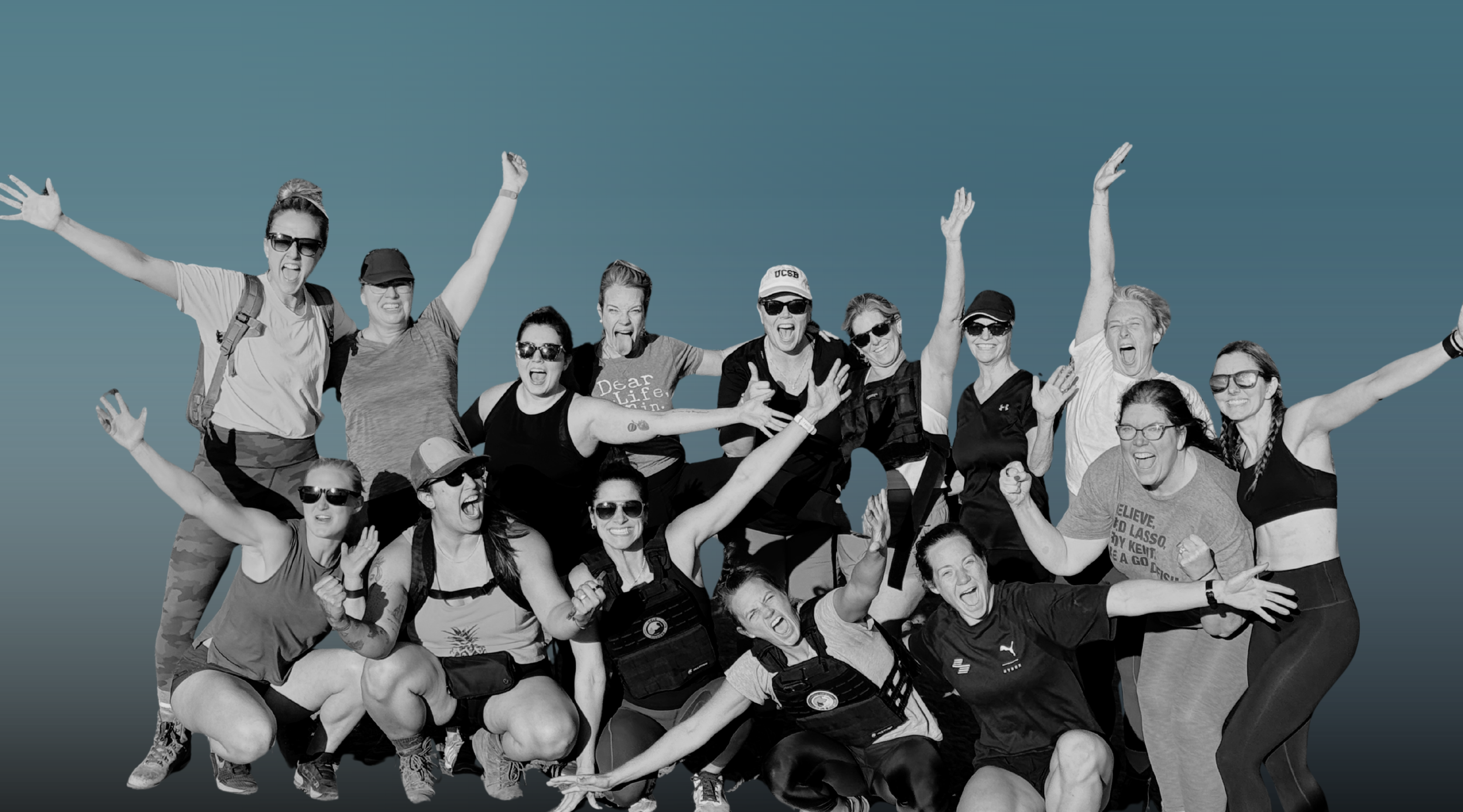 Group of excited women celebrating outside of DropGym Medford, Oregon. Arms are raised and wearing athletic clothing and weighted vests.