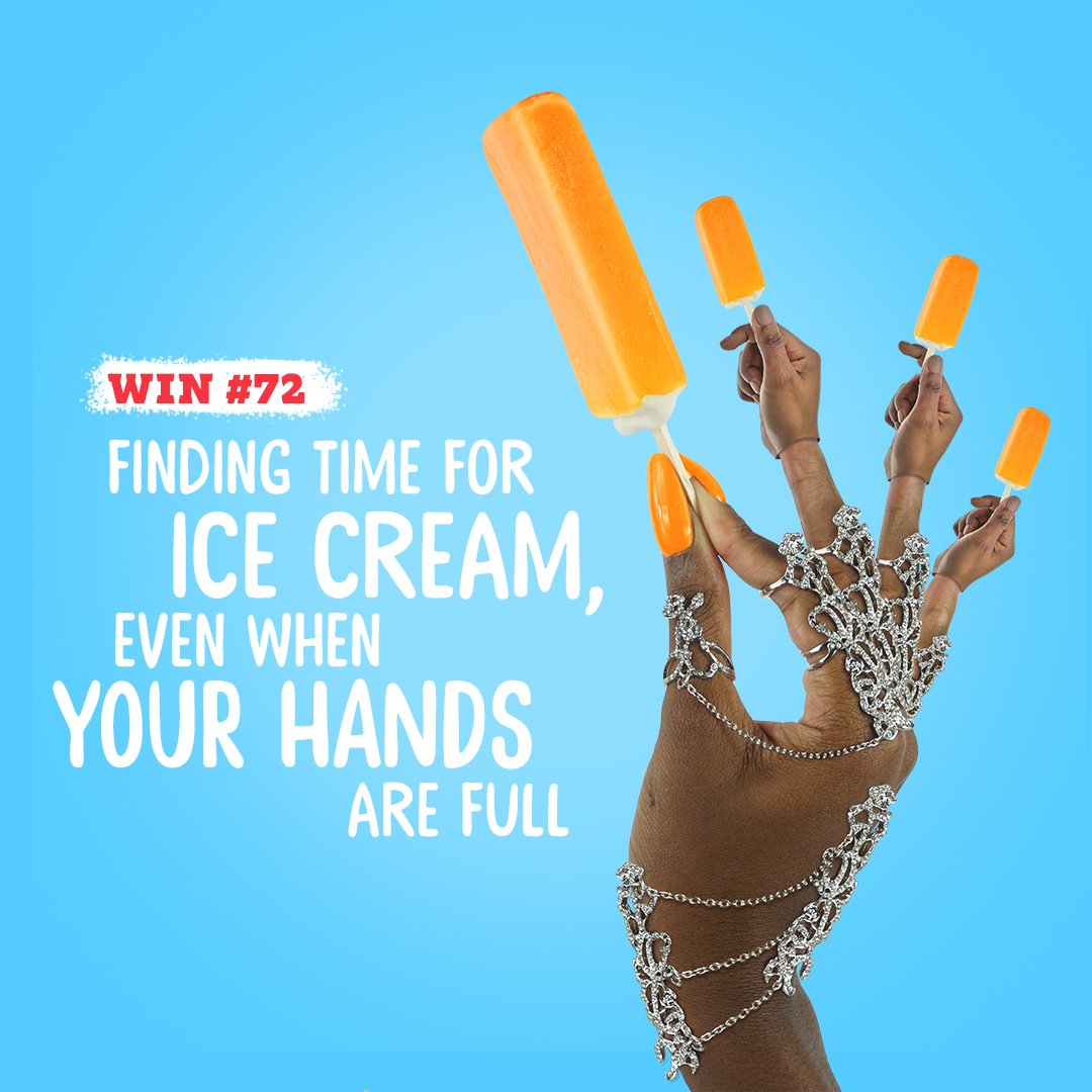 A hand with multiple silver chains and jewelry is holding three orange popsicles against a blue background, accompanied by text about finding time for ice cream even when hands are full.