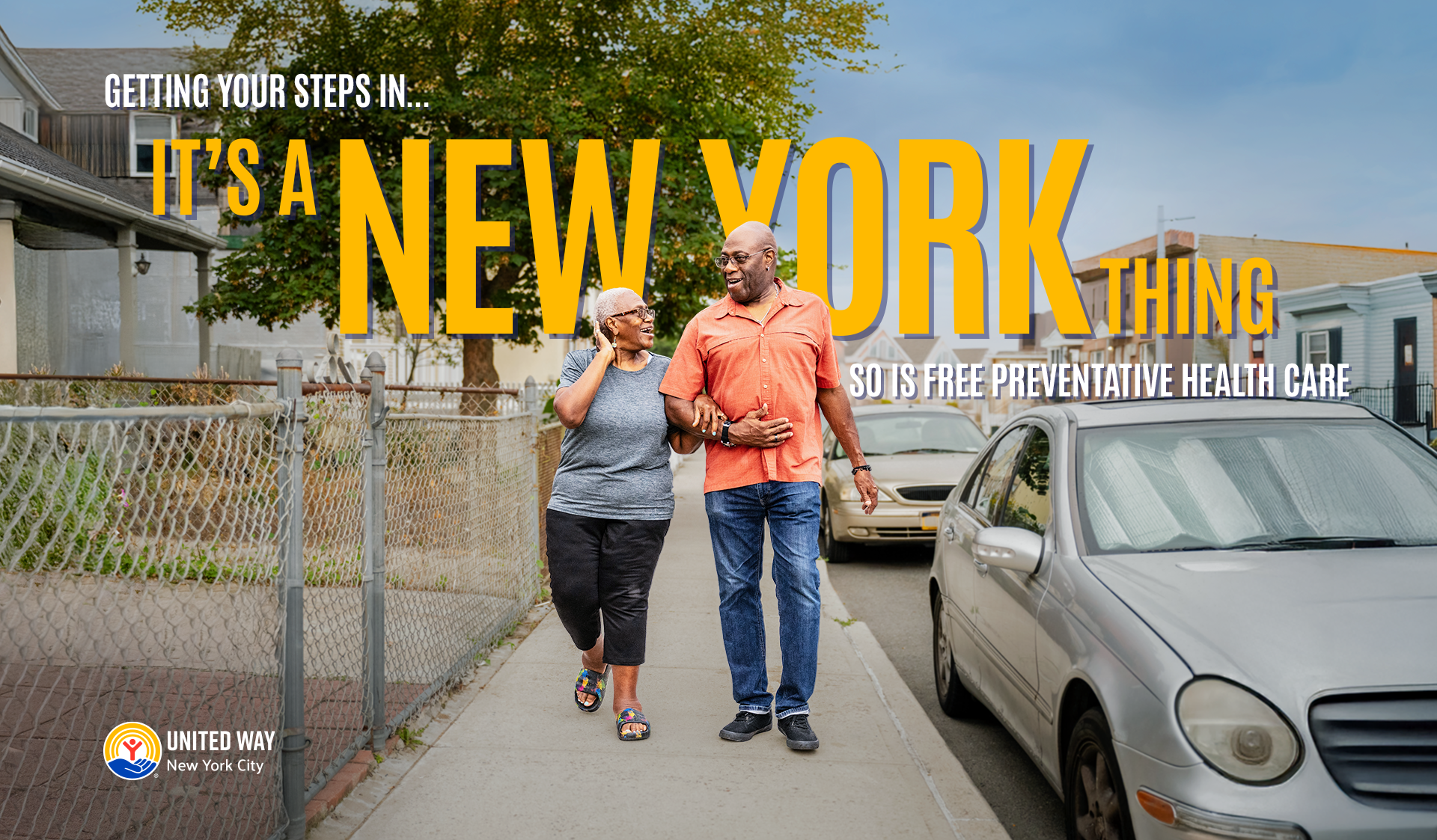 An elderly couple walking and smiling on a sidewalk in a neighborhood, with parked cars and houses around, promoting free preventive health care in New York City, with the United Way logo.