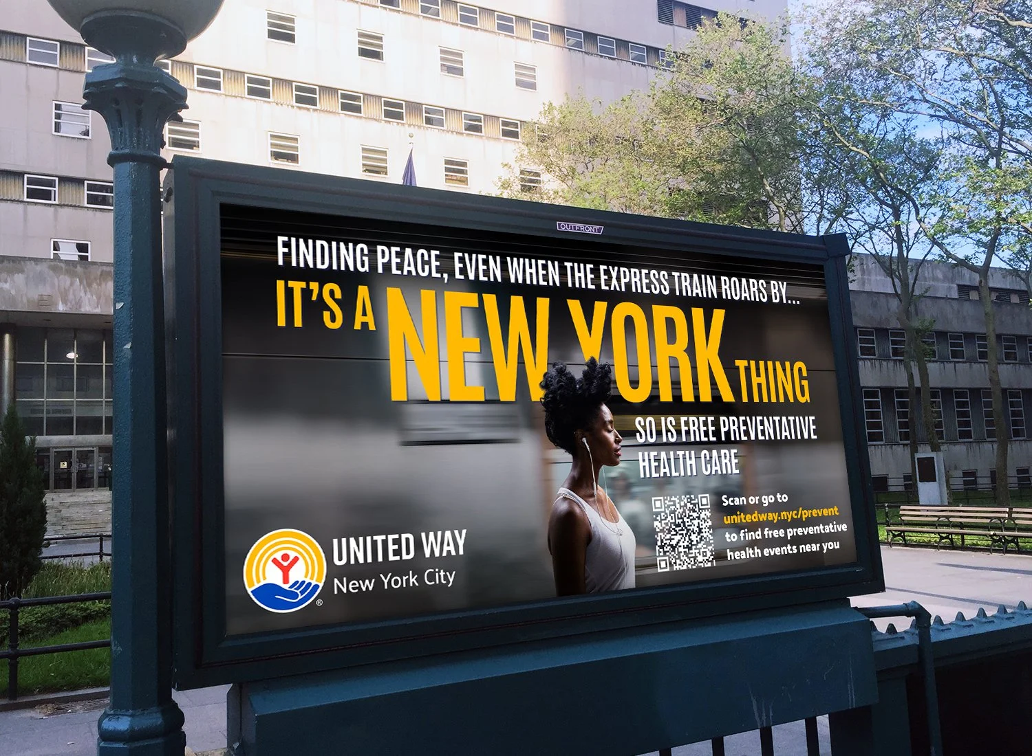 An outdoor advertisement billboard with a woman wearing earphones and looking to the right, promoting free preventive health care by United Way in New York City, with a QR code for more information.
