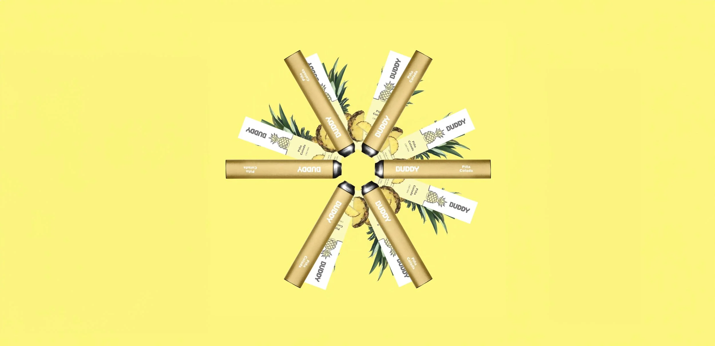Arrangement of pineapple-flavored vape pens and boxes with pineapples and pineapple leaves on a yellow background