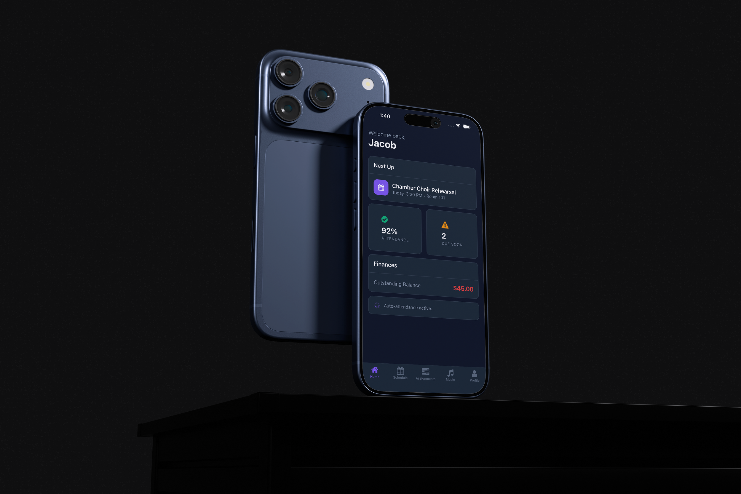 A dark background with a black surface, displaying a blue smartphone showing a school management app and a larger, darker blue iPhone behind it, angled to show both the screen and rear camera setup.