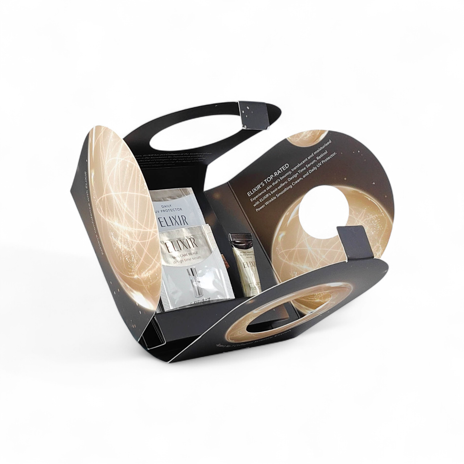 Elixir sample packaging holder with multiple compartments and precision die-cuts, designed to organise and display skincare samples in a compact format.​