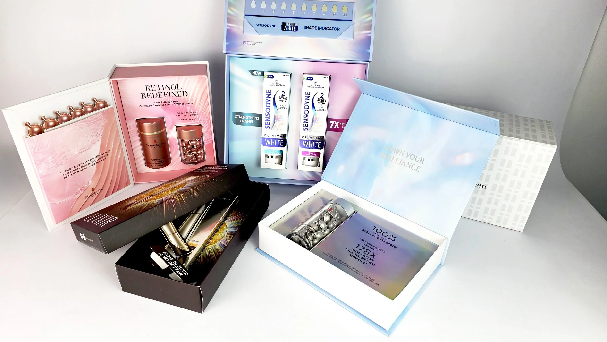 Press and KOL kit packaging with organised compartments and product displays, designed for media distribution and campaign launches.​