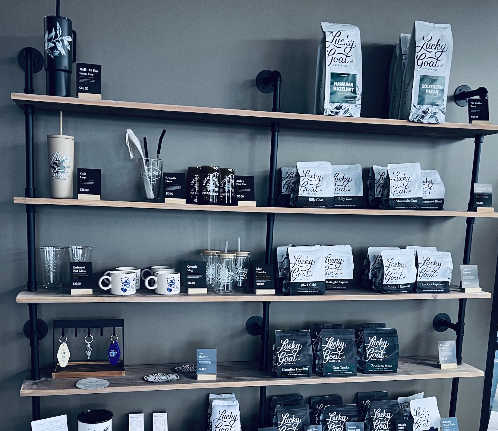 Coffee and Coffee cups on a shelf display