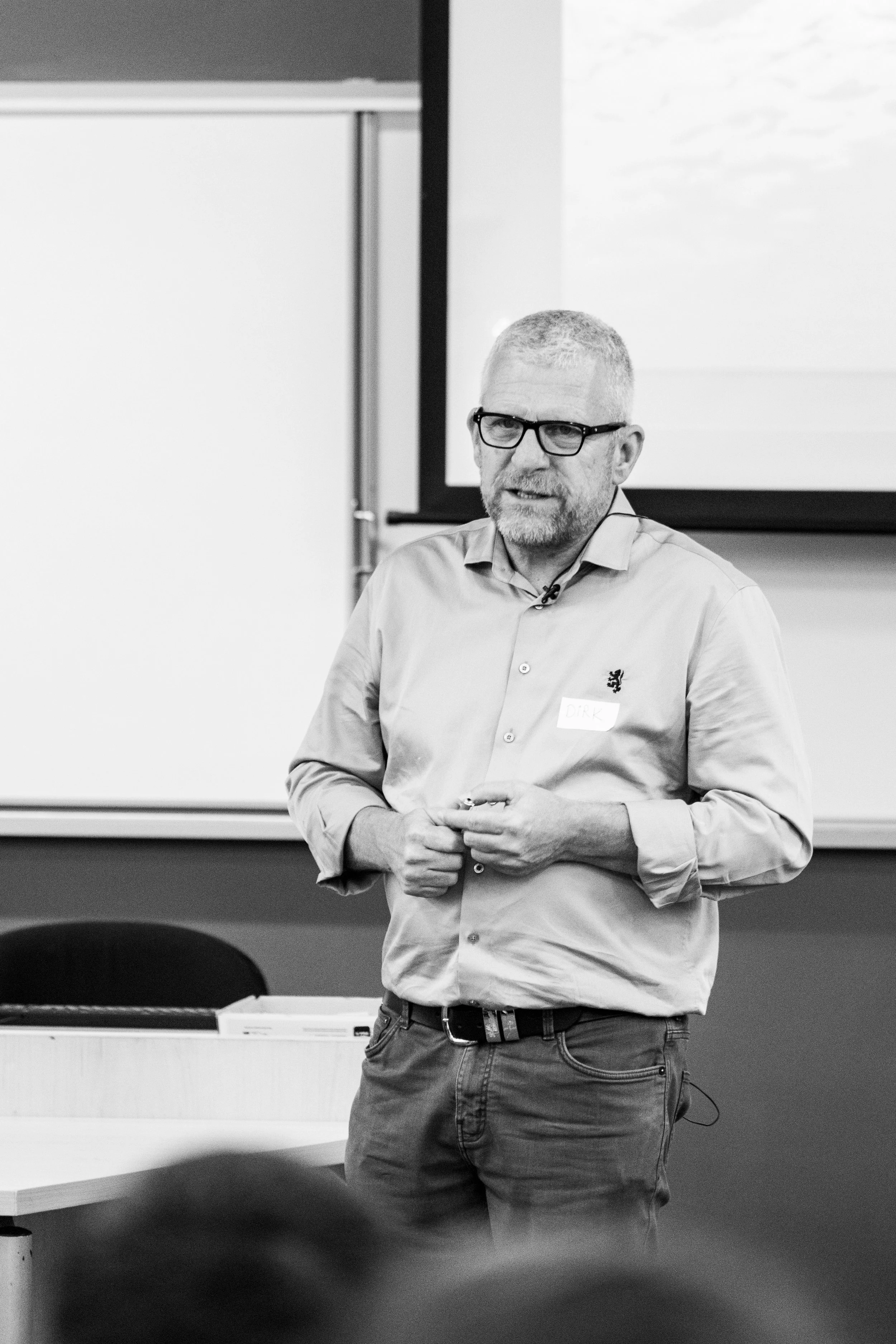 Business speaker giving a presentation during a leadership session at a Scale Up Partners conference in Johannesburg, April 2025