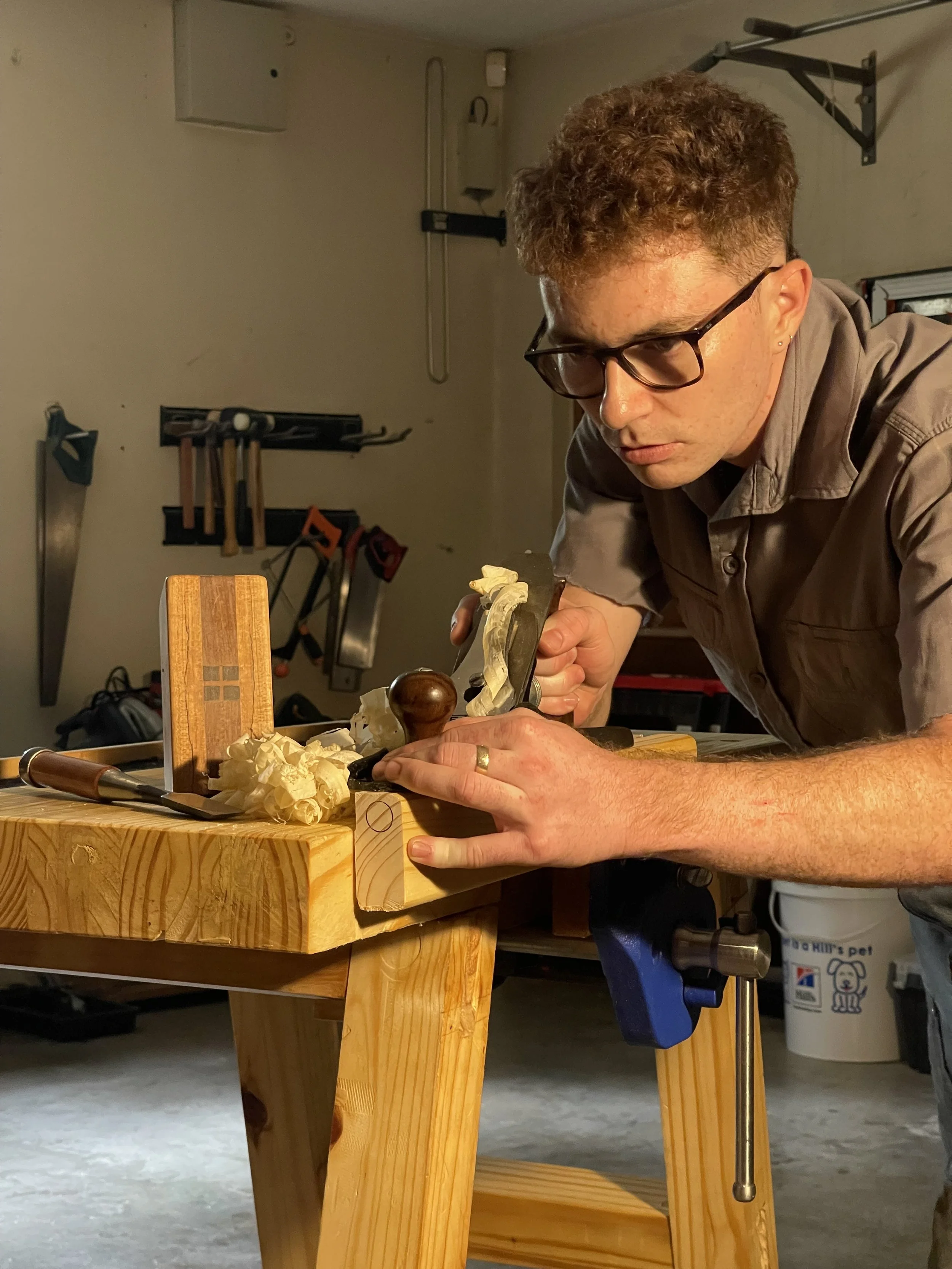 Head furniture maker, owner and founder of Saunter Fine Furniture, making custom hardwood furniture for sale in South Africa.