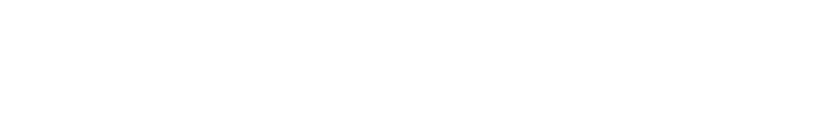 Logo of The Times with a crest featuring lions, a globe, and banners.