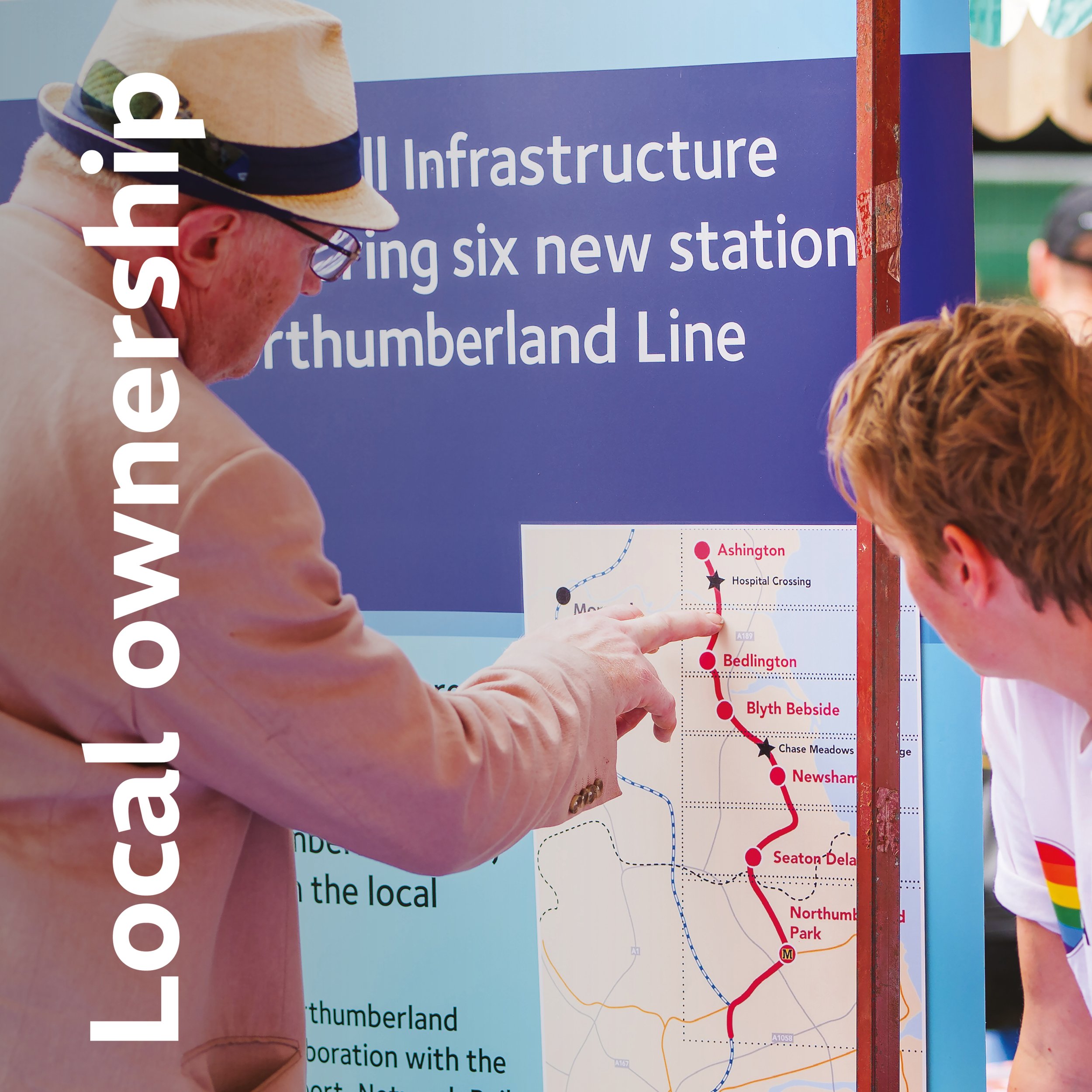 Members of public look at the Northumberland Line map