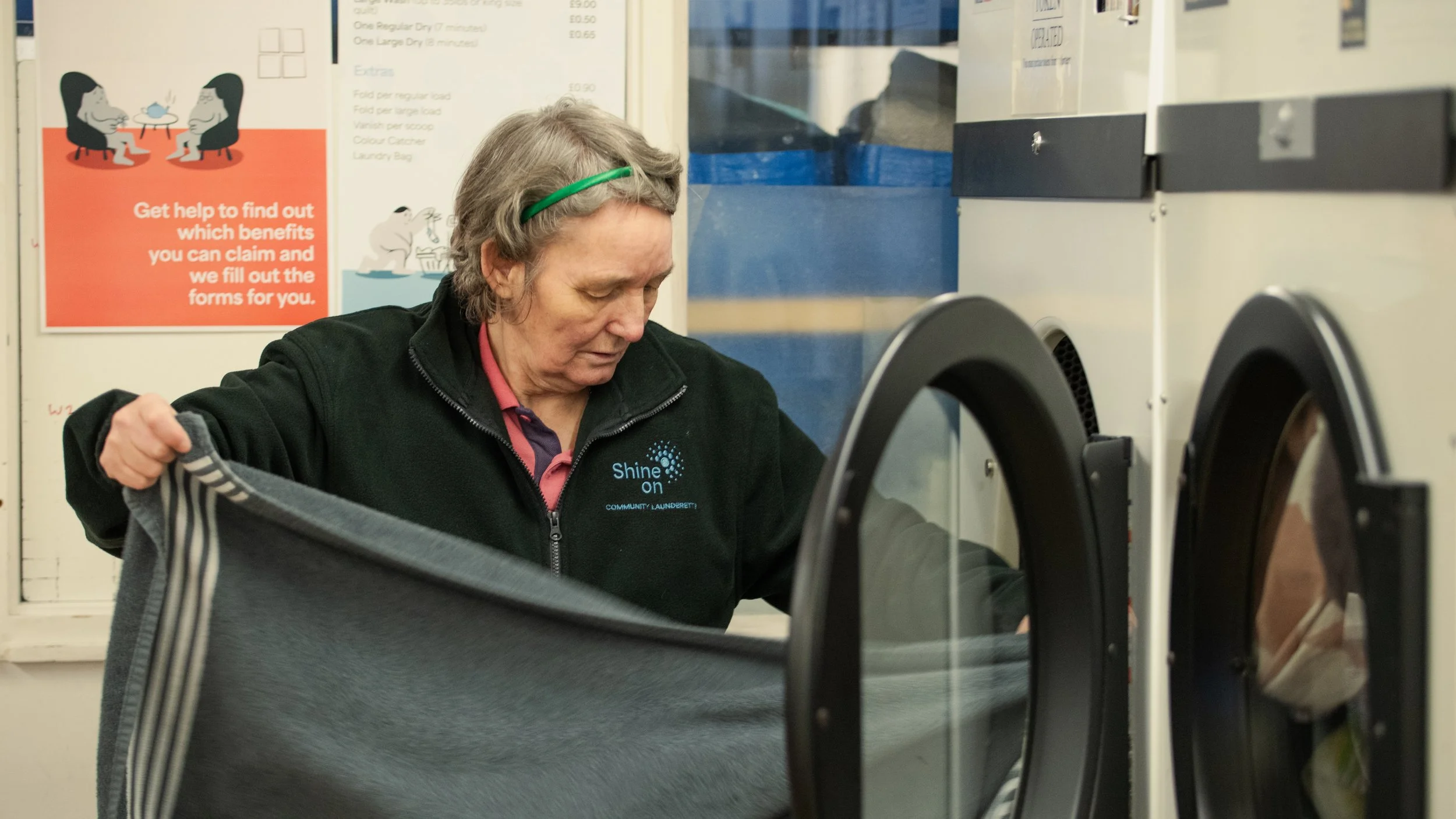 An employee at the Shine On Charity Laundrette in Newcastle