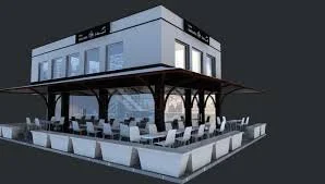 Bâtiment moderne avec terrasse extérieure et mobilier de restaurant