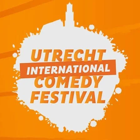 Logo for Utrecht International Comedy Festival with orange background and white splash shape featuring the event name in bold orange and white letters.