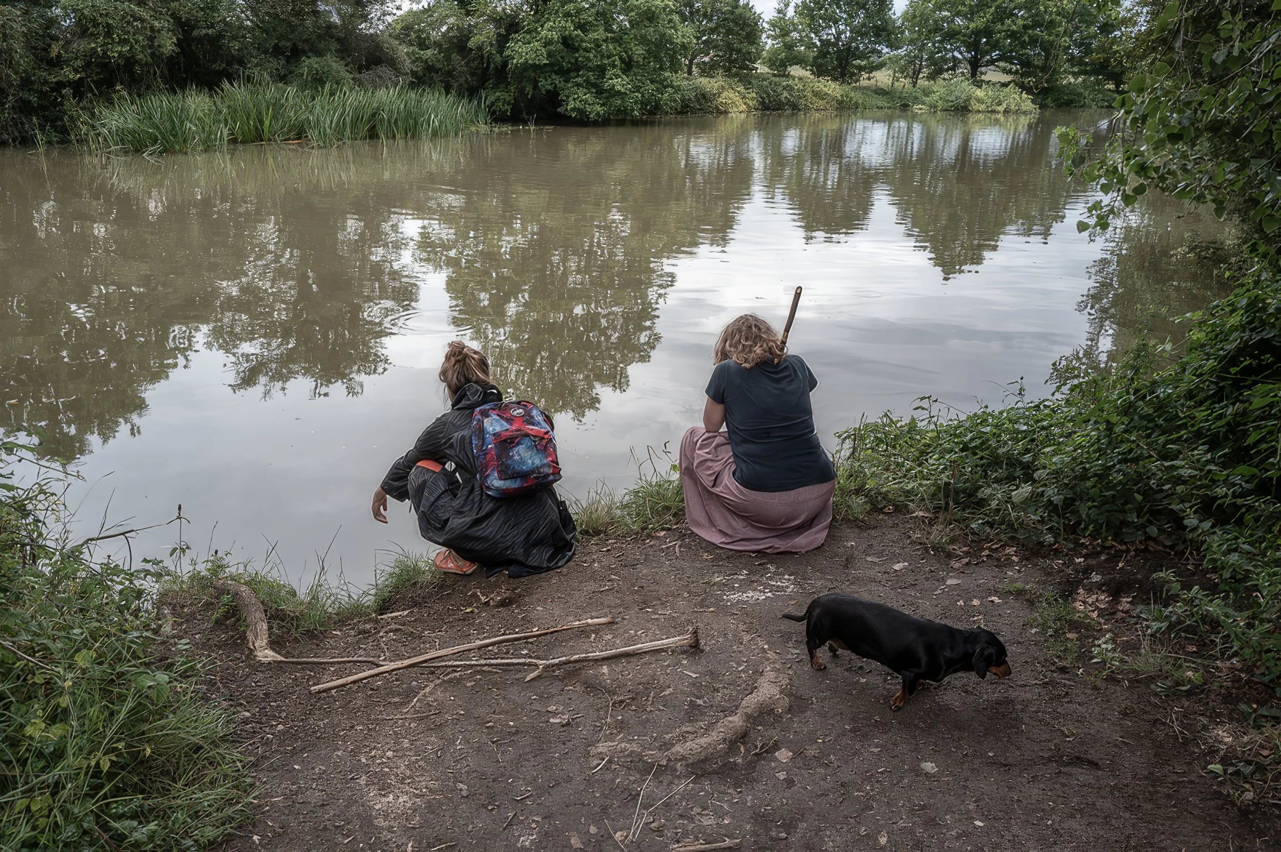 Geometric drawing of an outline square with sections divided by vertical, horizontal, and half circle lines.