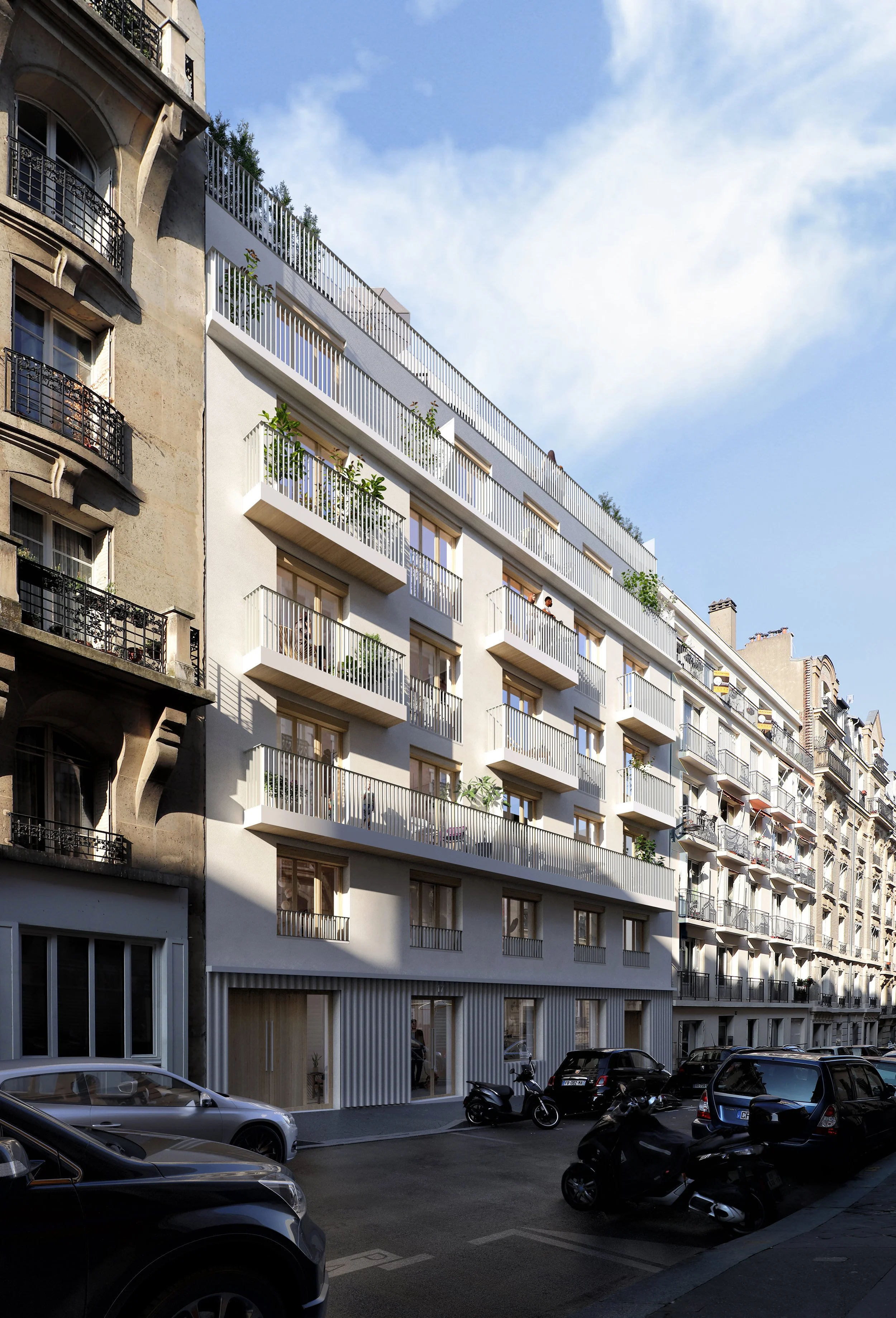 Un bâtiment résidentiel moderne avec plusieurs étages, balcons avec des plantes, et des fenêtres en façade, situé dans une rue ensoleillée avec des voitures et des scooters garés devant.