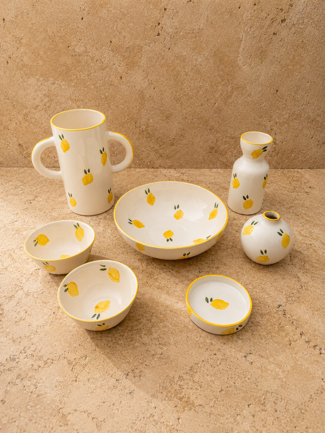 Collection complète Limão en céramique artisanale portugaise avec vases, bols et saladier.