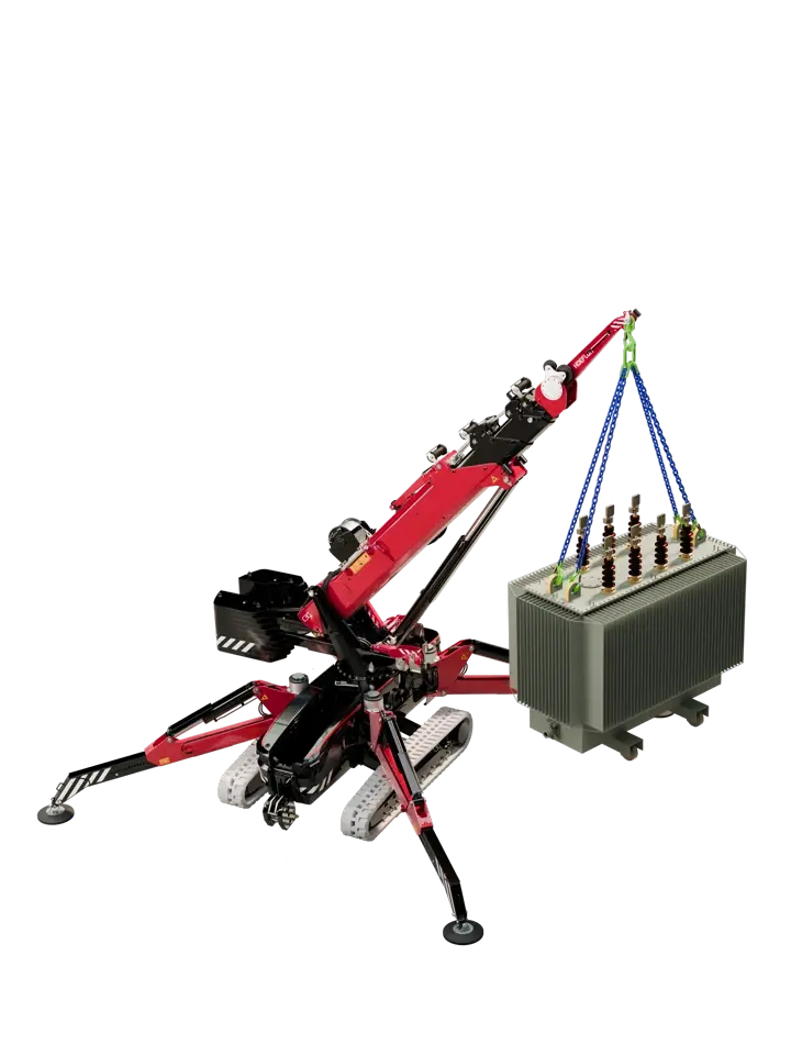 A red and black robotic crane lifting a large transformer with blue straps.