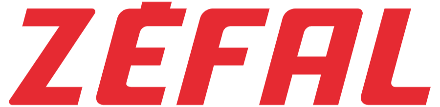 Logo con la parola 'ZEFAL' in rosso su sfondo bianco.