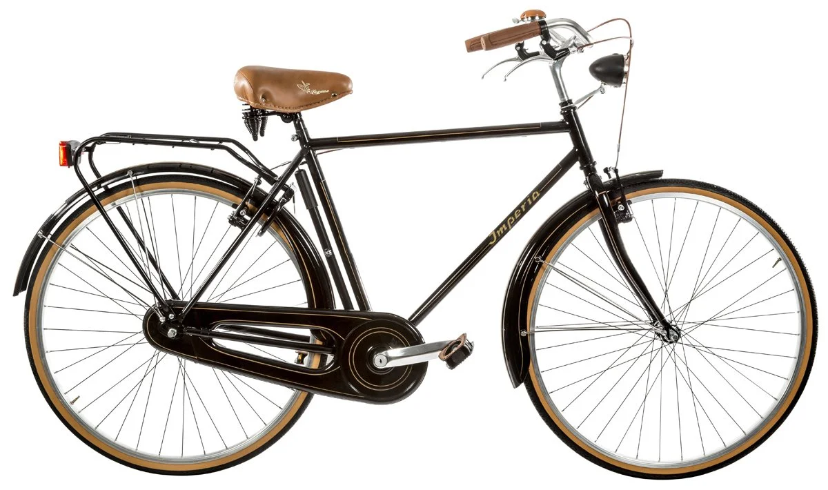 Bicicletta vintage con telaio nero, sella marrone e manubri con impugnature marroni, pneumatici con banda marrone.