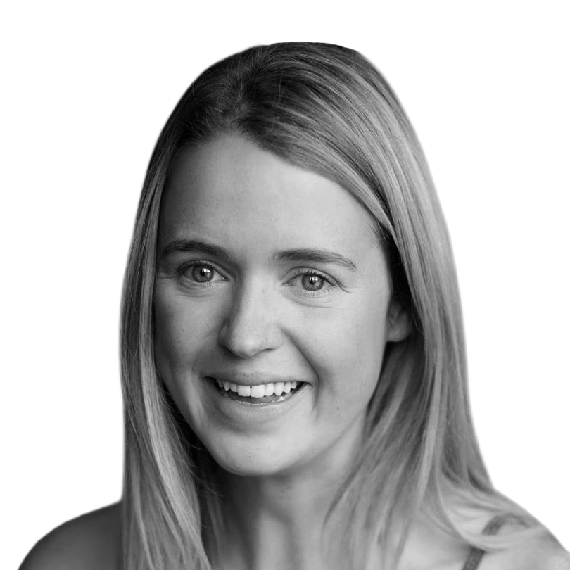 Black and white portrait of a smiling young woman with straight hair, looking at the camera.