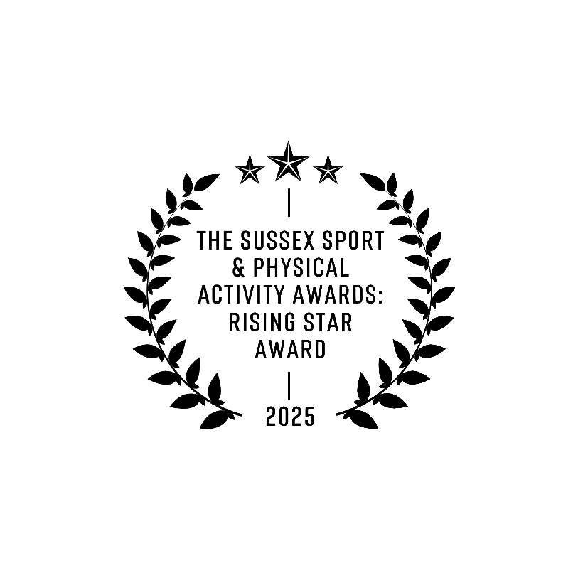 An award emblem with a star at the top, a laurel wreath surrounding the text, which reads: "The Sussex Sport & Physical Activity Award Rising Star Award 2025."