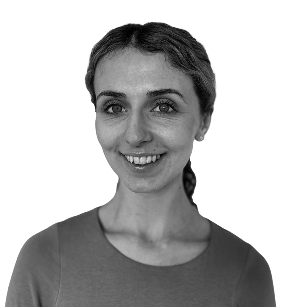 Black and white portrait of a woman with short hair, smiling, wearing a round-neck top, against a plain background.