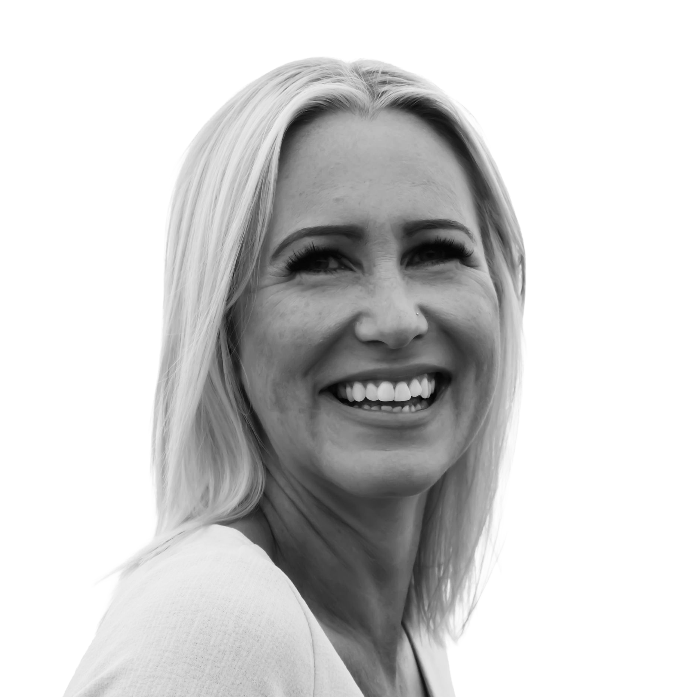 Black and white portrait of a smiling woman with shoulder-length hair