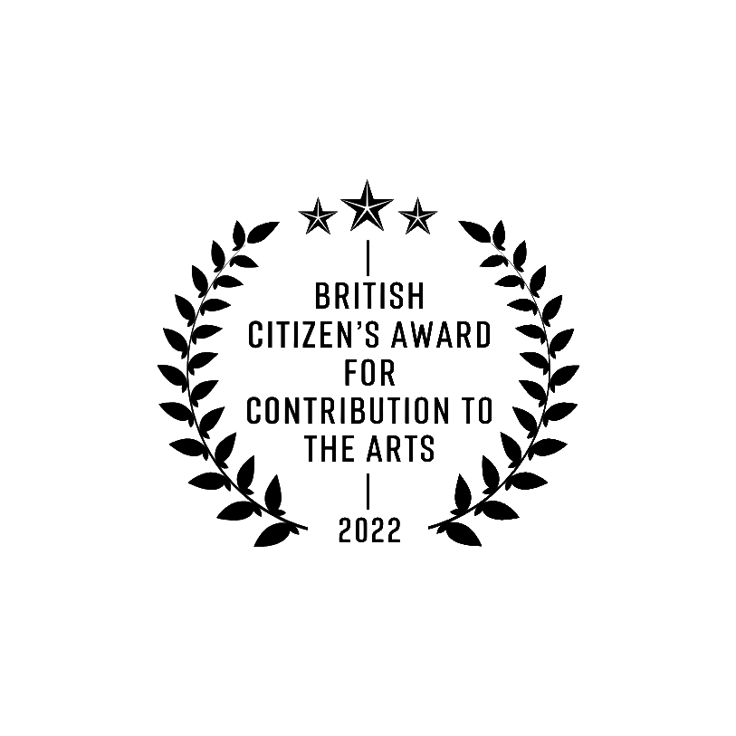 A laurel wreath with three stars above and text inside that reads 'British Citizen's Award for Contribution to the arts 2022'.