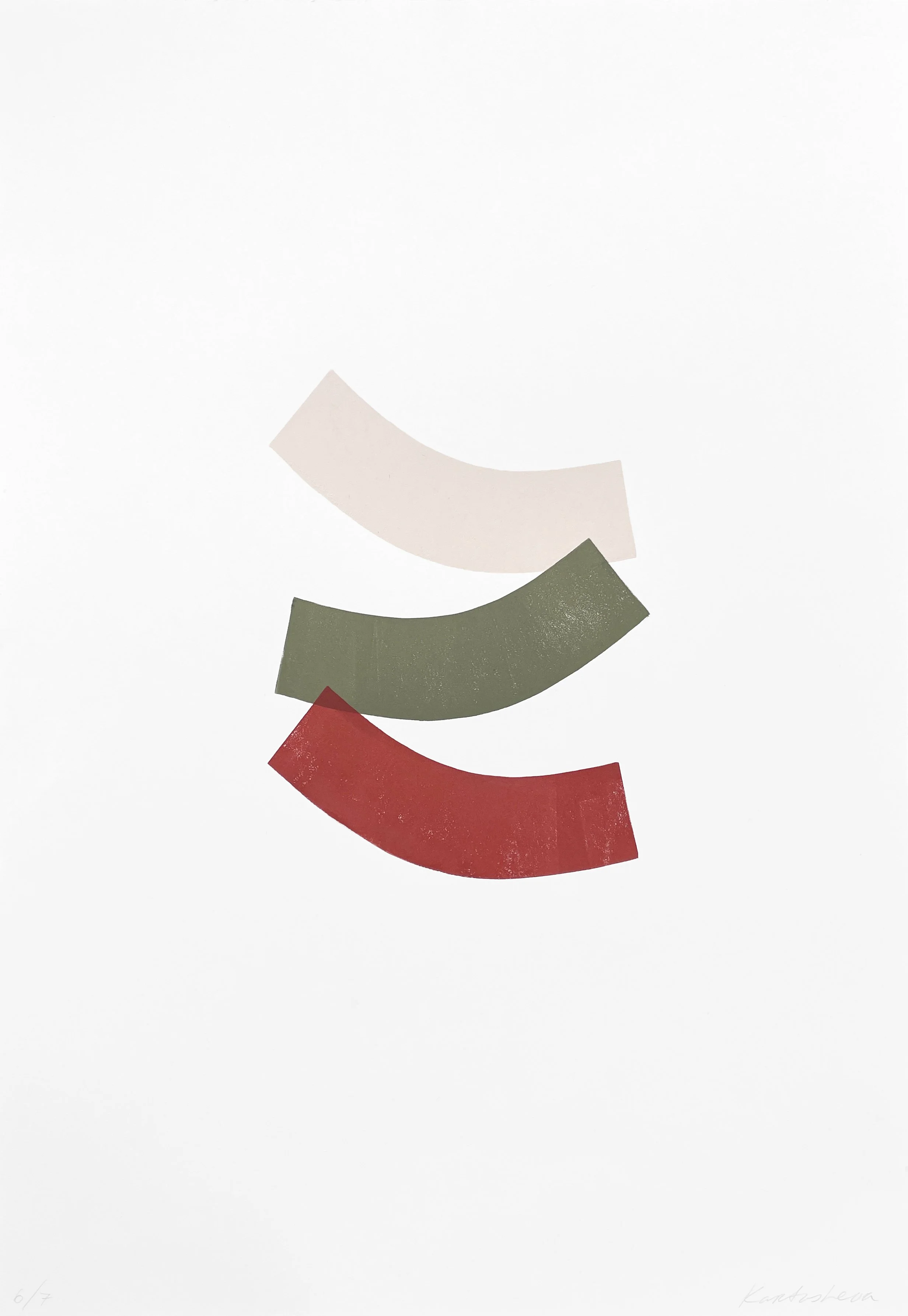 Three curved strips of paper in beige, green, and red arranged vertically on a white background.