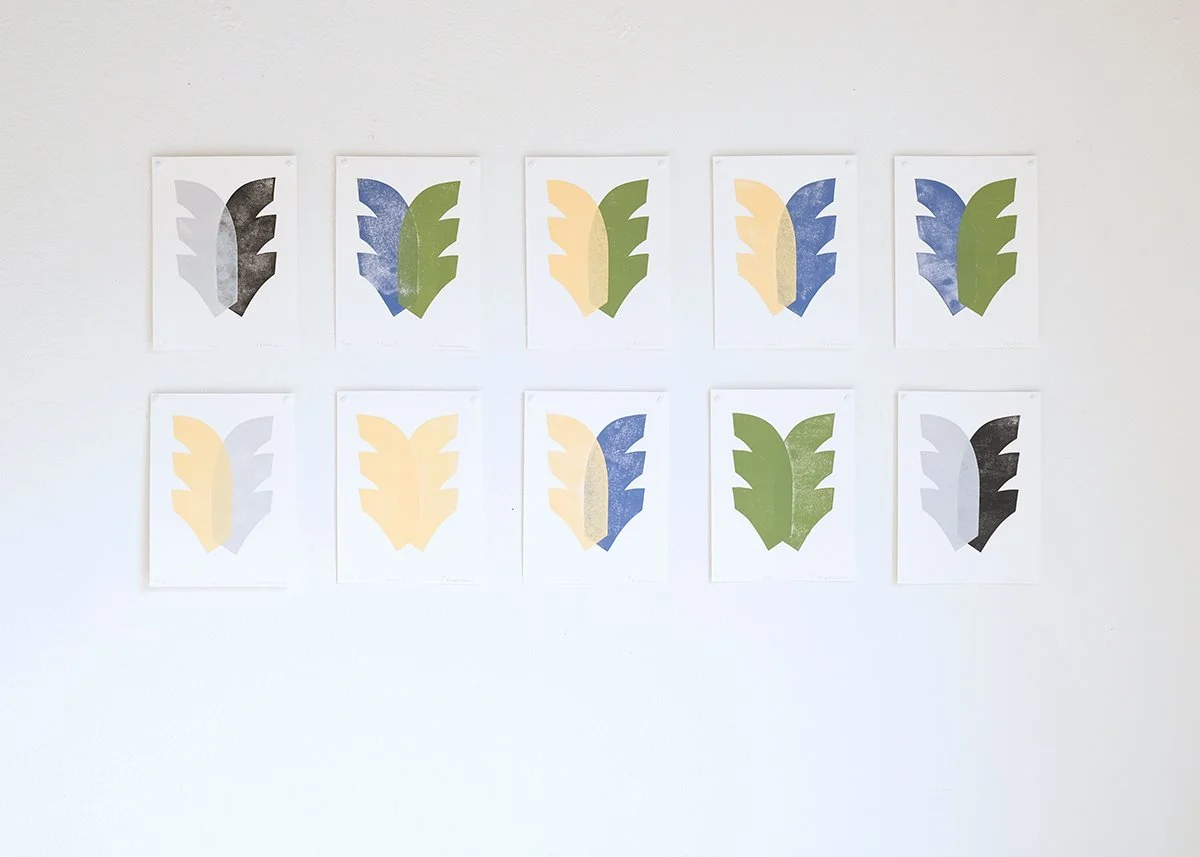 Ten abstract linoleum block hand printed editions, on paper, exhibited on the wall of the gallery in Laax, Switzerland.