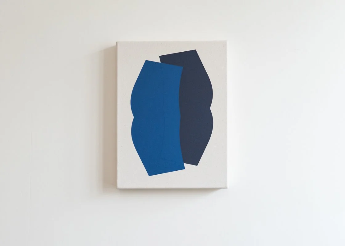 Abstract artwork with two overlapping curvy shapes, one blue and one dark blue, on a white canvas.