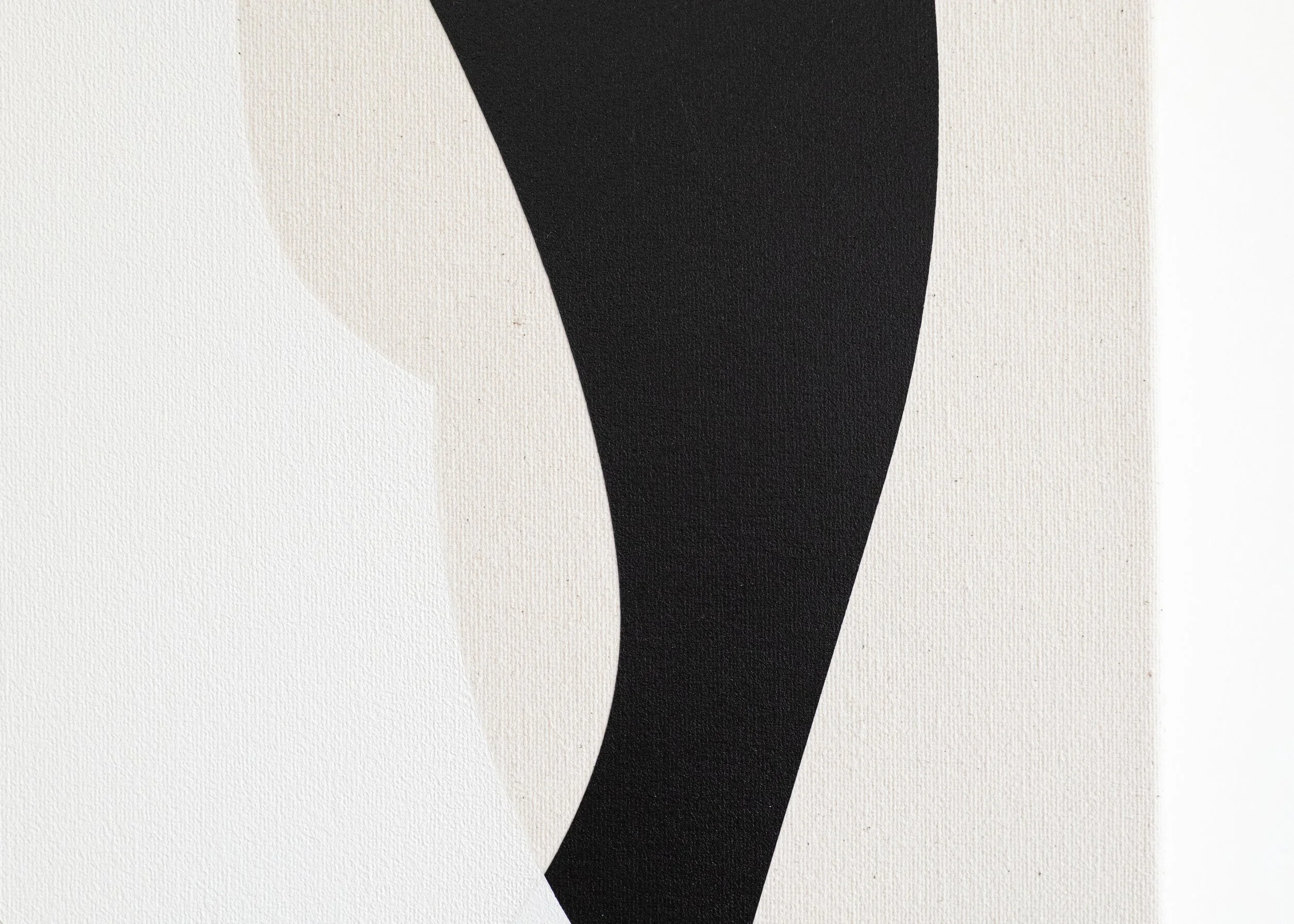 Abstract minimalist art with black and beige shapes on white background.