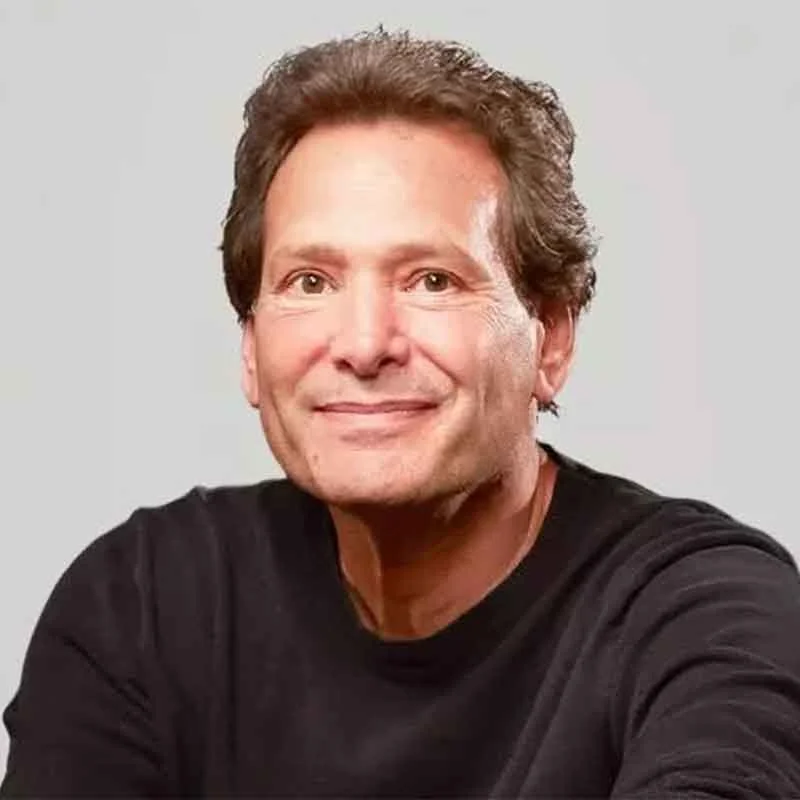 Professional headshot of Dan Shulman