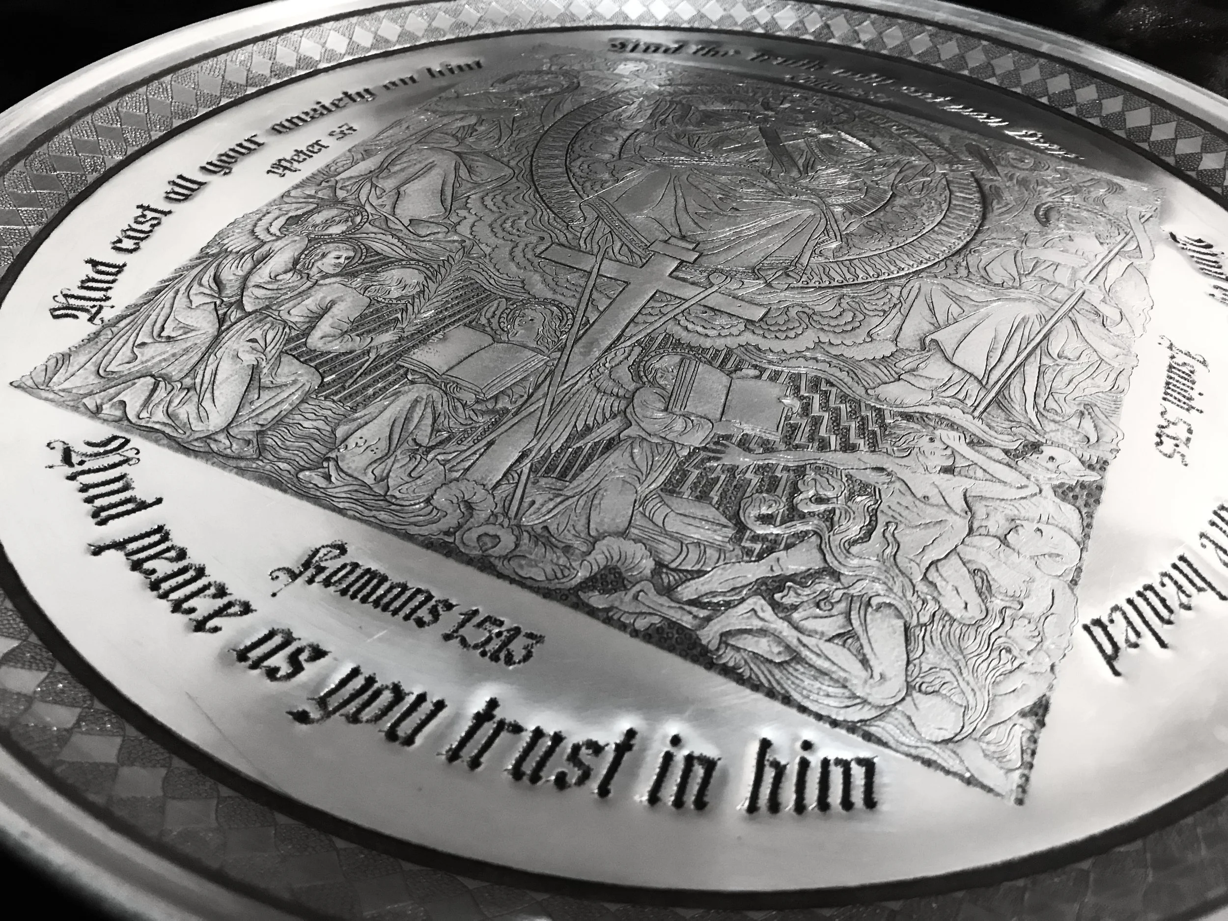 Jesus Christ and disciples, hand sculpted on a microscopic scope on silver