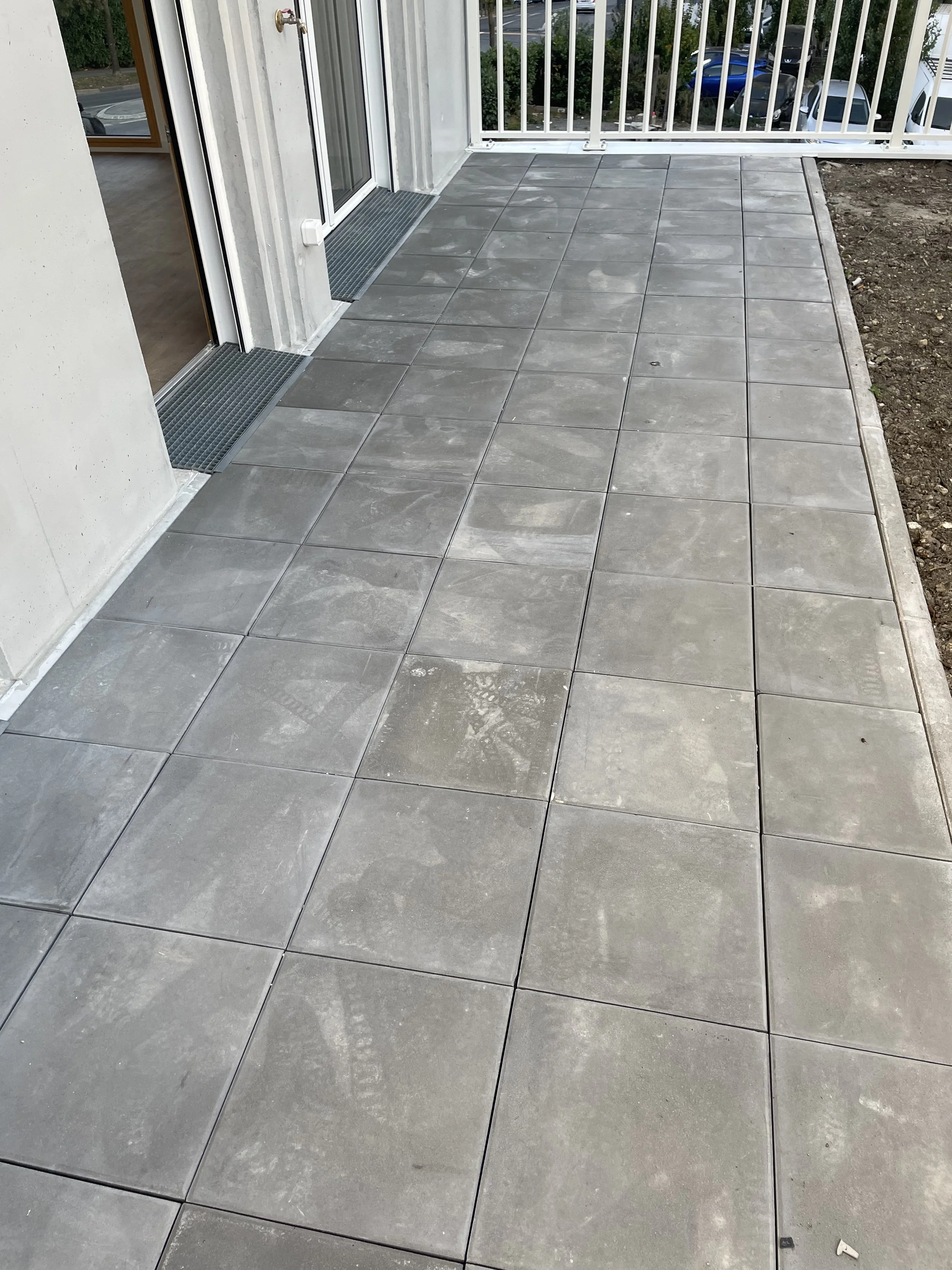 Revêtement d'une terrasse en dalle.