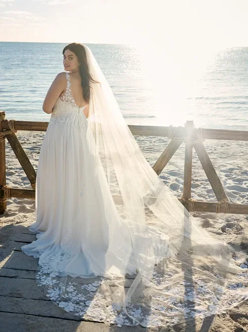 MAEVE-CURVE-LACE-CHIFFON-A-LINE-BOHO-WEDDING-DRESS-AT-EDEN-BRIDAL-BELFAST-2.webp