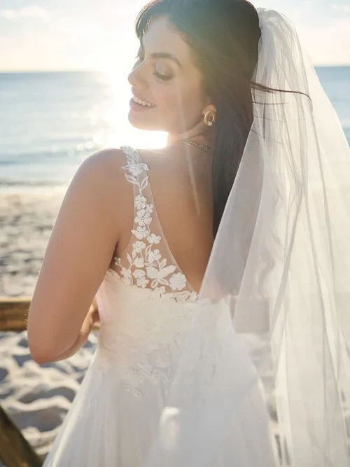 MAEVE-CURVE-LACE-CHIFFON-A-LINE-BOHO-WEDDING-DRESS-AT-EDEN-BRIDAL-BELFAST-3.webp